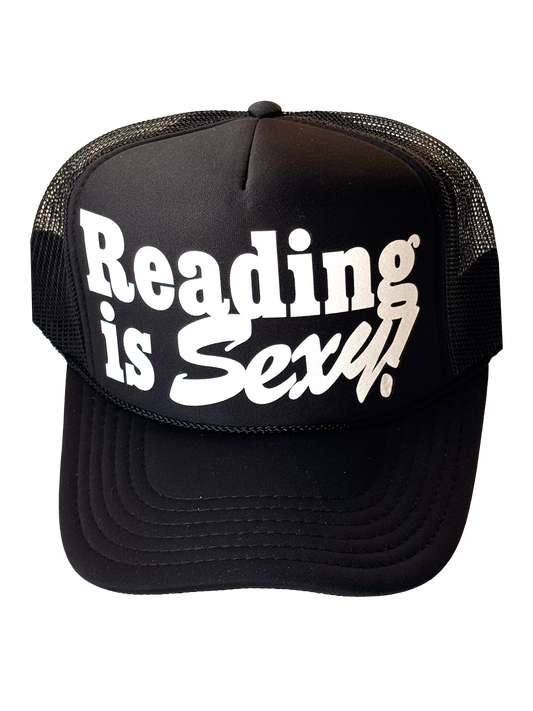 Black Otto trucker hat that says "reading is sexy" on it